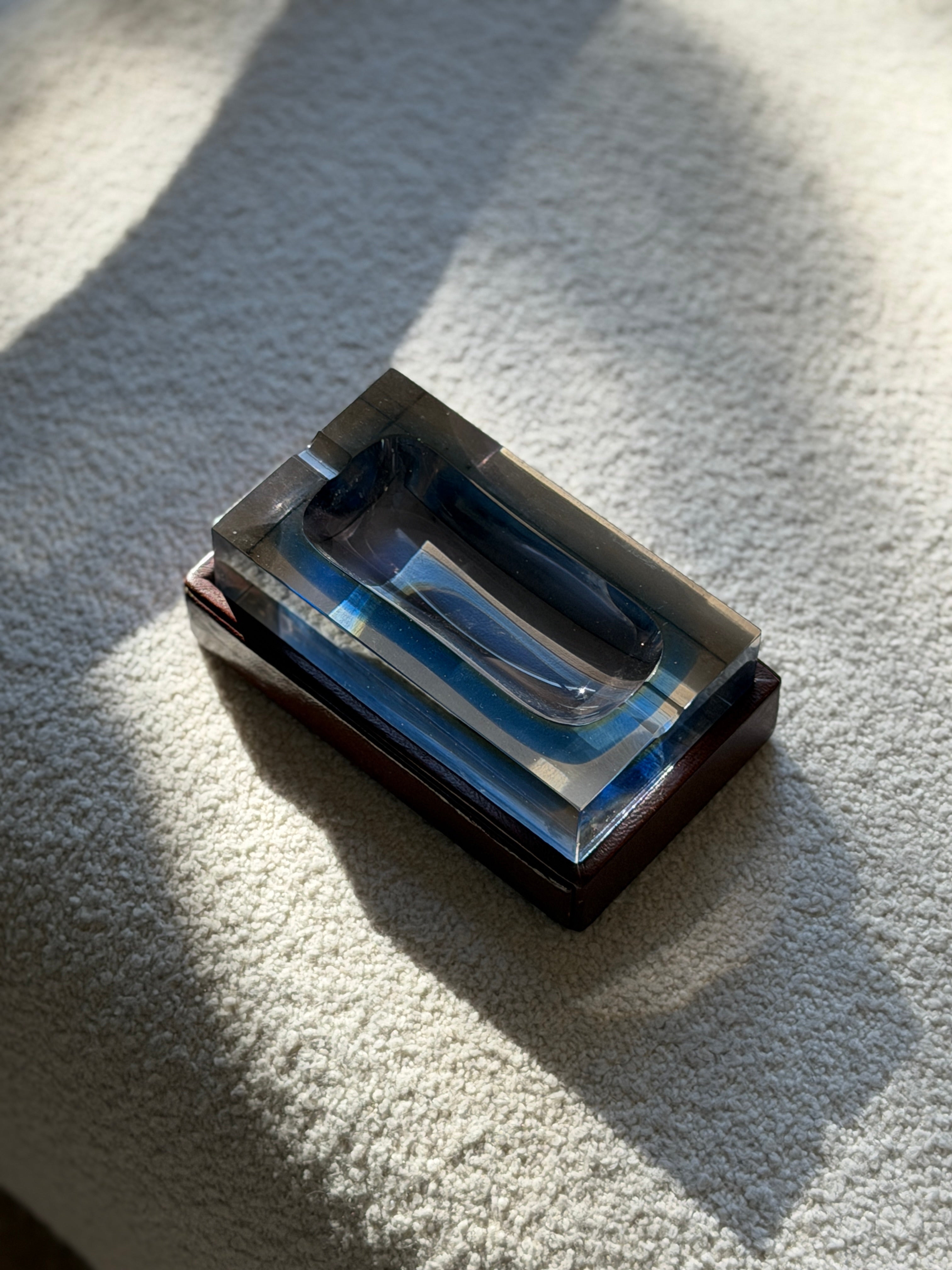 Top-down view of Flavio Poli for Seguso blue Bloc glass ashtray showing deep central recessed well from Collectors Gene