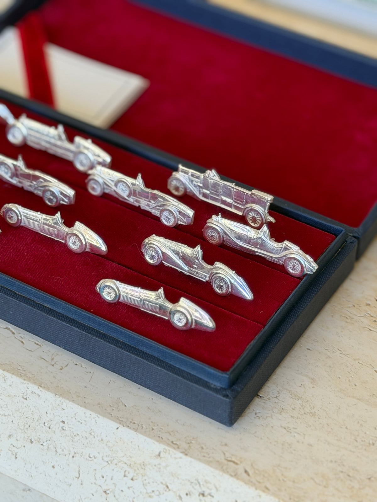 Final close-up grouping of place card holders viewed from an angled corner of the box