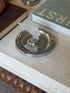 Art Deco frosted glass ashtray featuring the Lady Nicotine figure