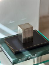 Front view of closed Art Deco silver plated cigarette box with vertical ribbed texture available at Collectors Gene