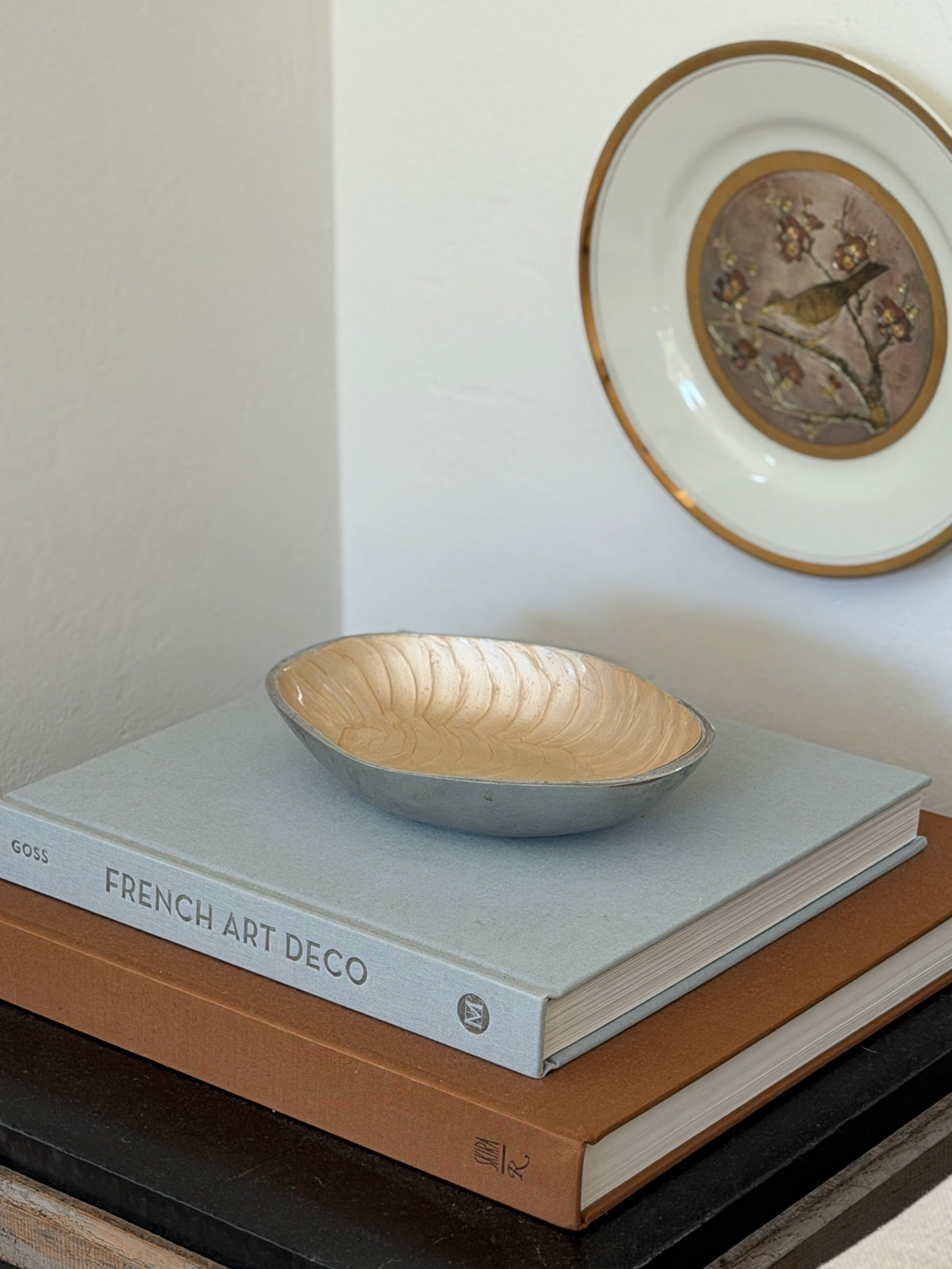 Curated room display shot featuring vintage Italian cream aluminum catchall dish from Collectors Gene