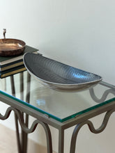 High angle perspective view of dark grey scalloped aluminum centerpiece bowl from Collectors Gene