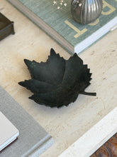 Collectors Gene vintage dark patinated bronze leaf figural vide poche catchall dish on travertine surface