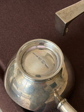 Close-up of the underside of one dish, showing the Bvlgari sterling silver hallmark stamped into the base