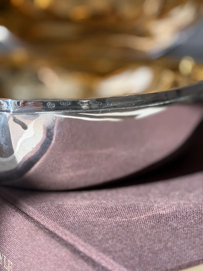 Close detail of the box rim stamped with a maker&