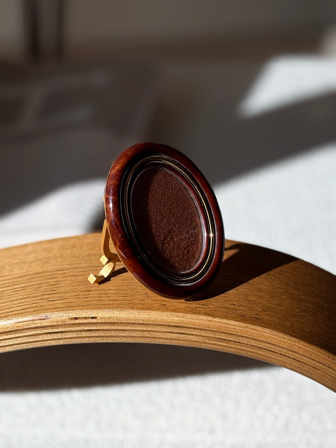 Cartier “Le Must de Cartier” Brown Enamel "Baignoire" Oval Picture Frame | Collectors Gene