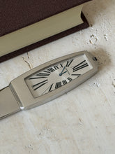 Close-up of the dial end, showing the Cartier name and Swiss Made text on the clock face