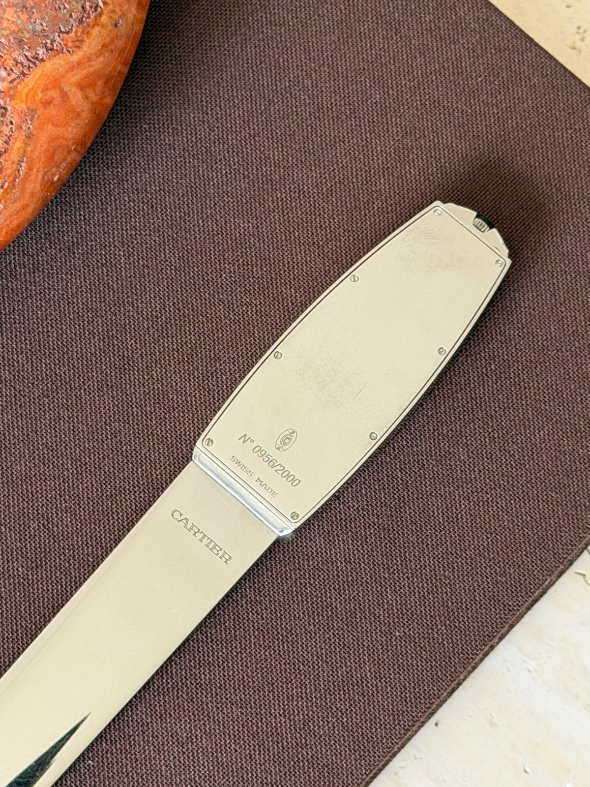 Close-up of the back of the handle, showing the engraved limited edition number and Cartier&