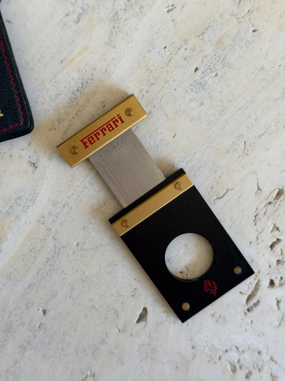 Close-up of the Ferrari and Made in Italy engraving on the extended cutter blade