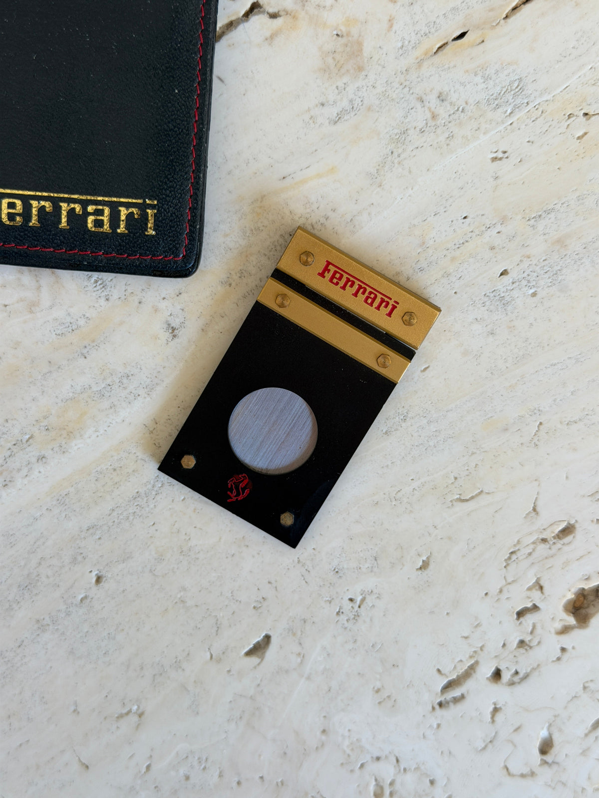 Ferrari guillotine cigar cutter with matching leather pouch, Italy c.1980