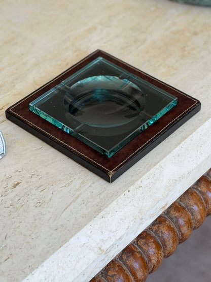 Front view of mid-century Fontana Arte glass and leather vide poche tray from Collectors Gene