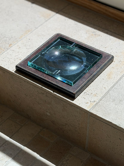 High angle perspective view of 7.5 inch Fontana Arte Italian heavy glass ashtray with leather base available at Collectors Gene