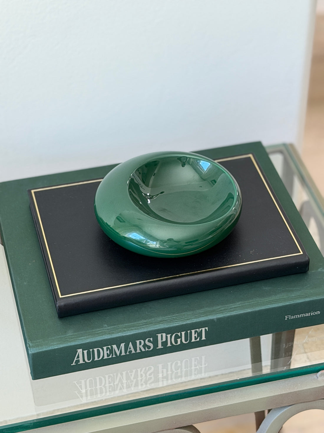 High angle view of 5.5 inch round forest green Sicart ceramic vide poche available at Collectors Gene