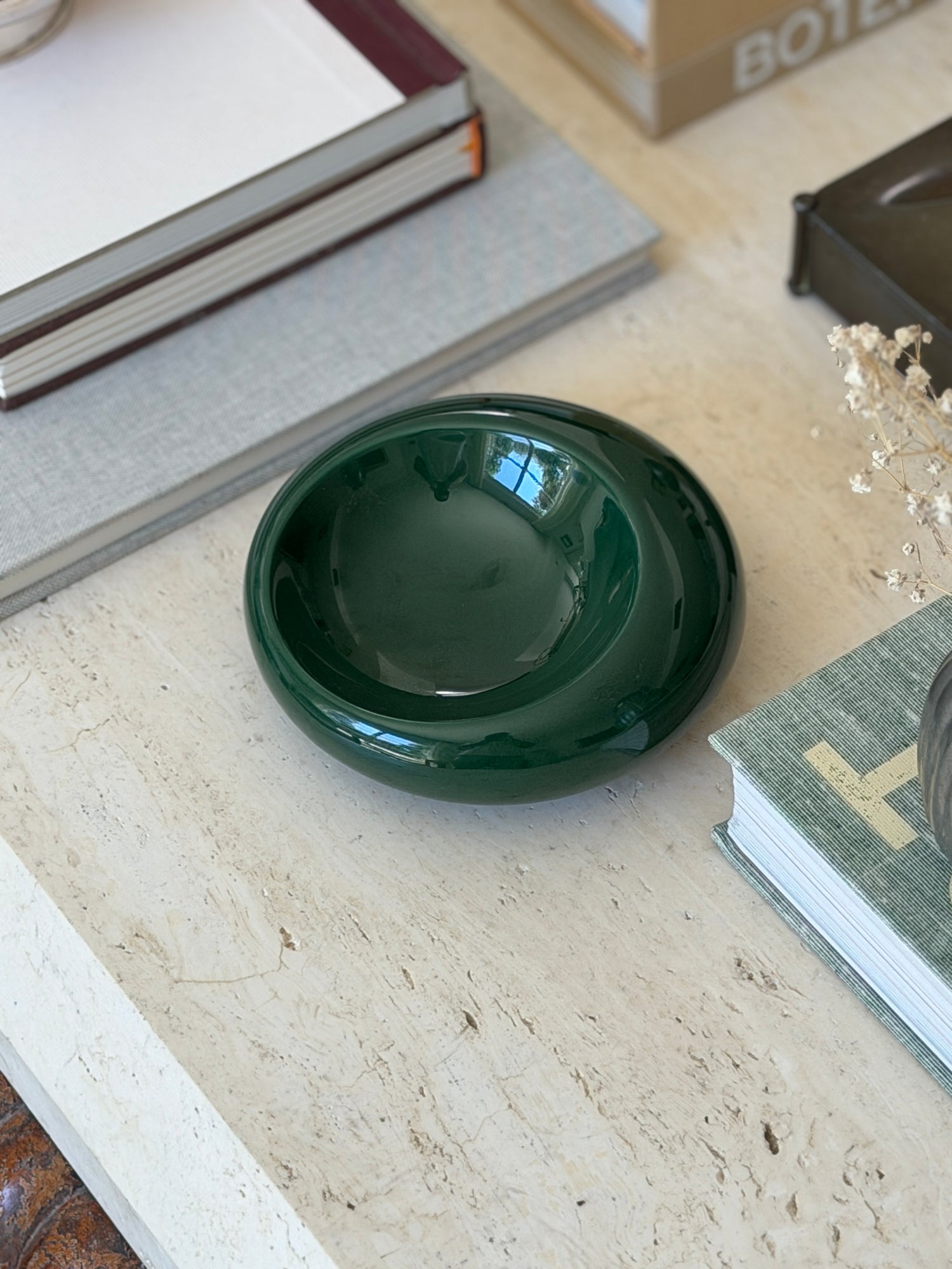 Vintage c.1960 Sicart forest green glazed ceramic circular catchall dish styled on travertine console table from Collectors Gene