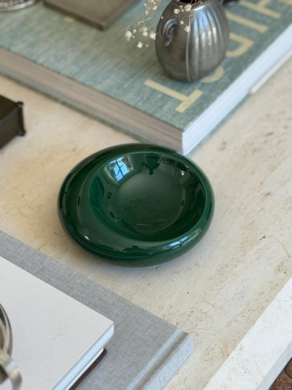 Curated executive desk scene featuring vintage Italian forest green ceramic catchall dish from Collectors Gene