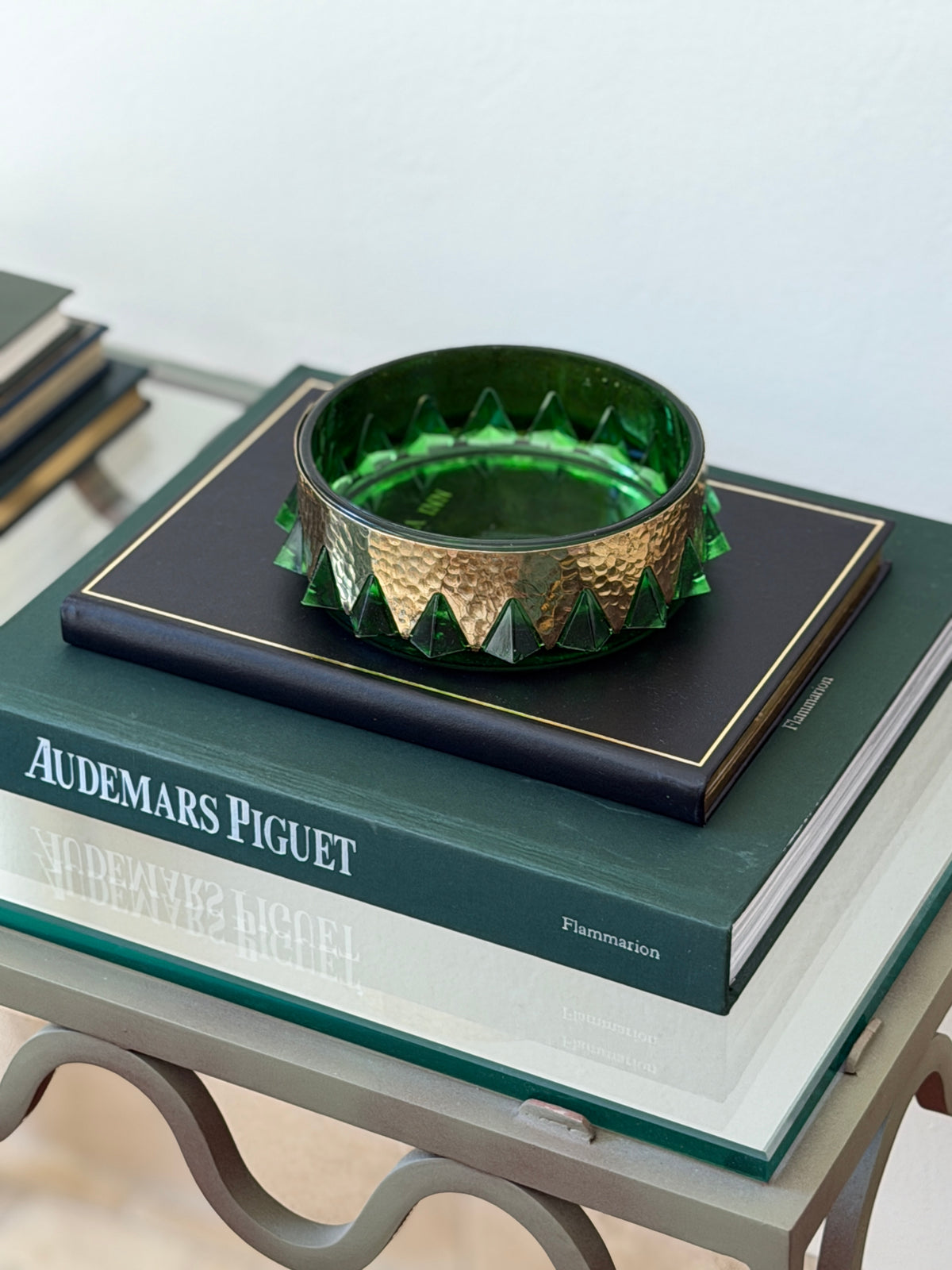 High angle view showing geometric crown projections on vintage emerald green glass vide poche by Collectors Gene