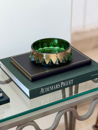 Collectors Gene mid-century emerald green glass ashtray vide poche displayed on side table with books