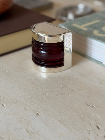 Front-facing view of the Hermes nautical boat light box in silver and maroon