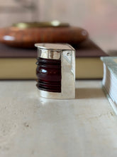 Side profile view of the Hermes boat light box showing its ribbed glass body