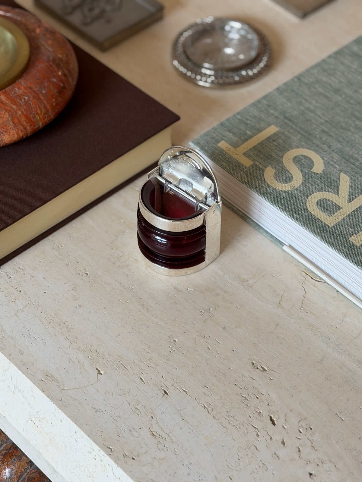 Hermes nautical boat light box with its silver lid open, showing the hollow interior