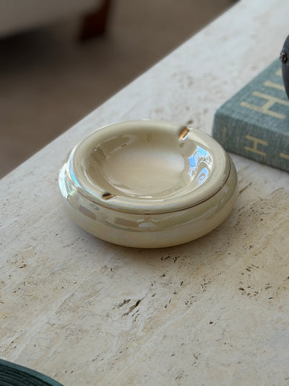 Curated table context shot featuring 1970s cream beige Italian ceramic catchall dish from Collectors Gene