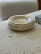 Eye-level profile view of cream and gold mid-century Italian ceramic ashtray available at Collectors Gene