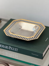 Side profile view of square-recessed octagonal mixed-metal tray displayed on books at Collectors Gene