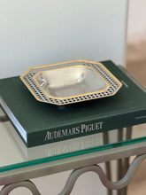 Vintage c.1980 Italian octagonal gold and silver mixed-metal catchall dish on green display book from Collectors Gene