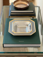 Overhead view of 7.5 inch octagonal Italian gold and silver vide poche tray on glass table available at Collectors Gene
