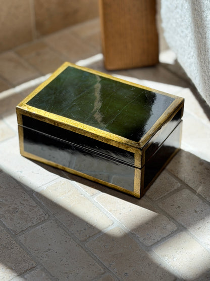 Vintage 1980s Italian forest green lacquered wood box with gold gilt border trim in natural sunlight from Collectors Gene