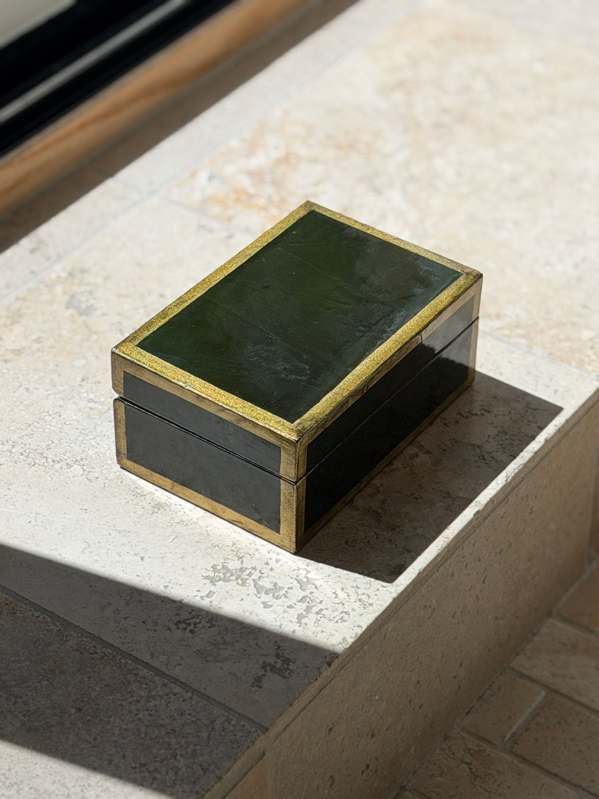 Top-down view of 6.5 inch vintage Italian lacquered trinket box with metallic trim from Collectors Gene