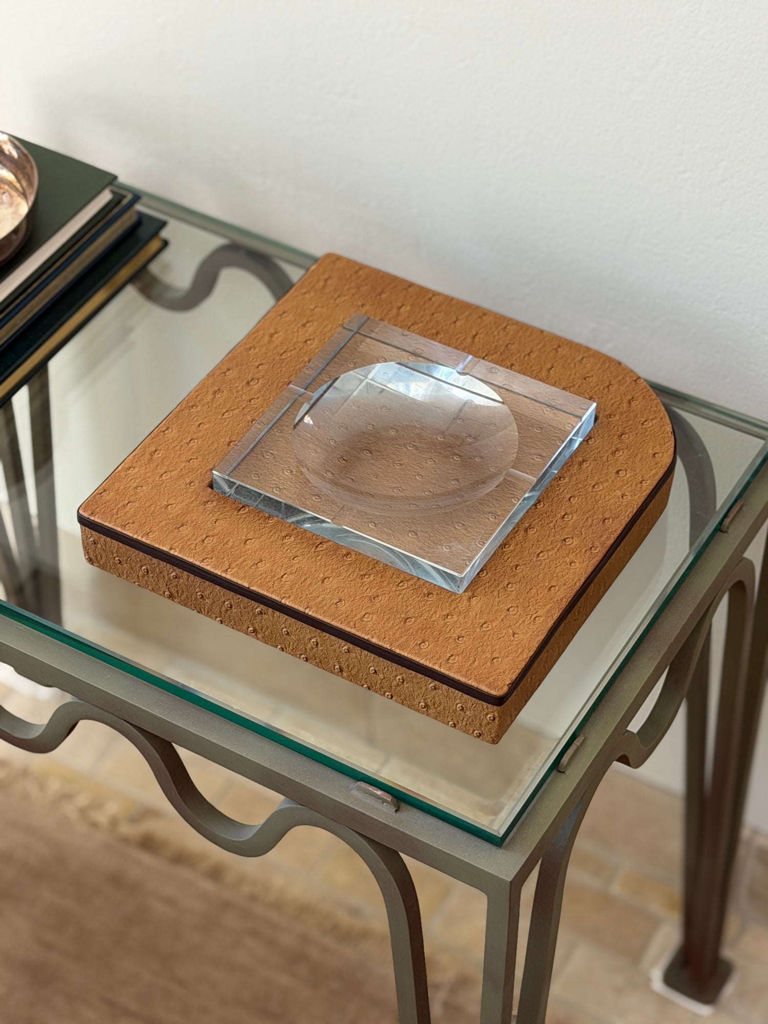 Side perspective view of 10-inch c.1980 Italian decorative glass vide poche in brown leather frame at Collectors Gene