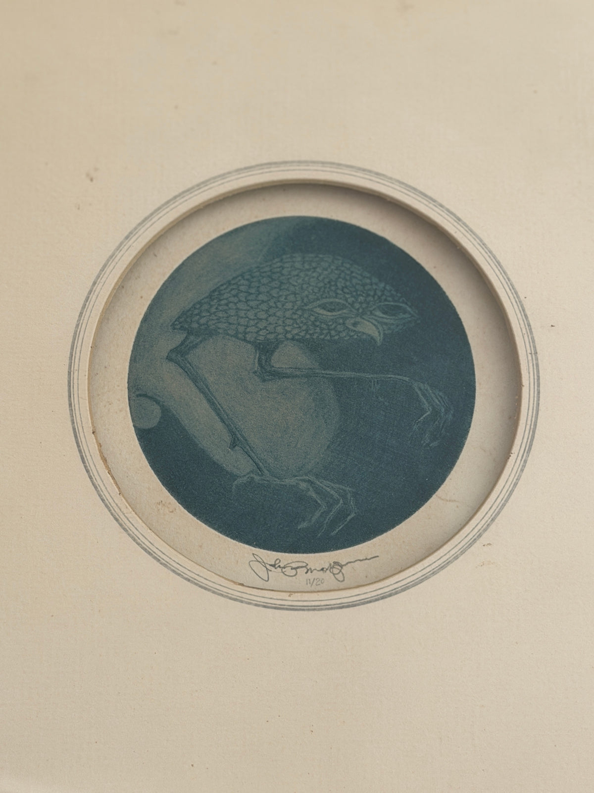 Close up of the round mezzotint within its beveled mat, showing the pencil signature and edition number below the image