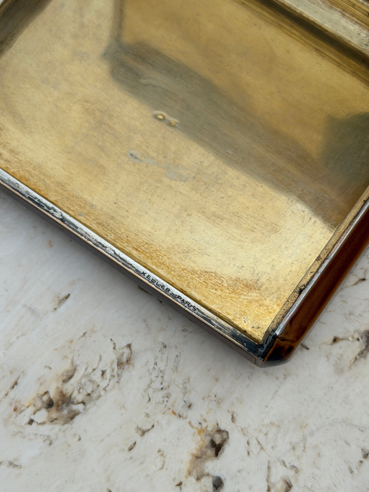 Close up of the gilt interior rim stamped KELLER PARIS, with small French hallmarks in the base