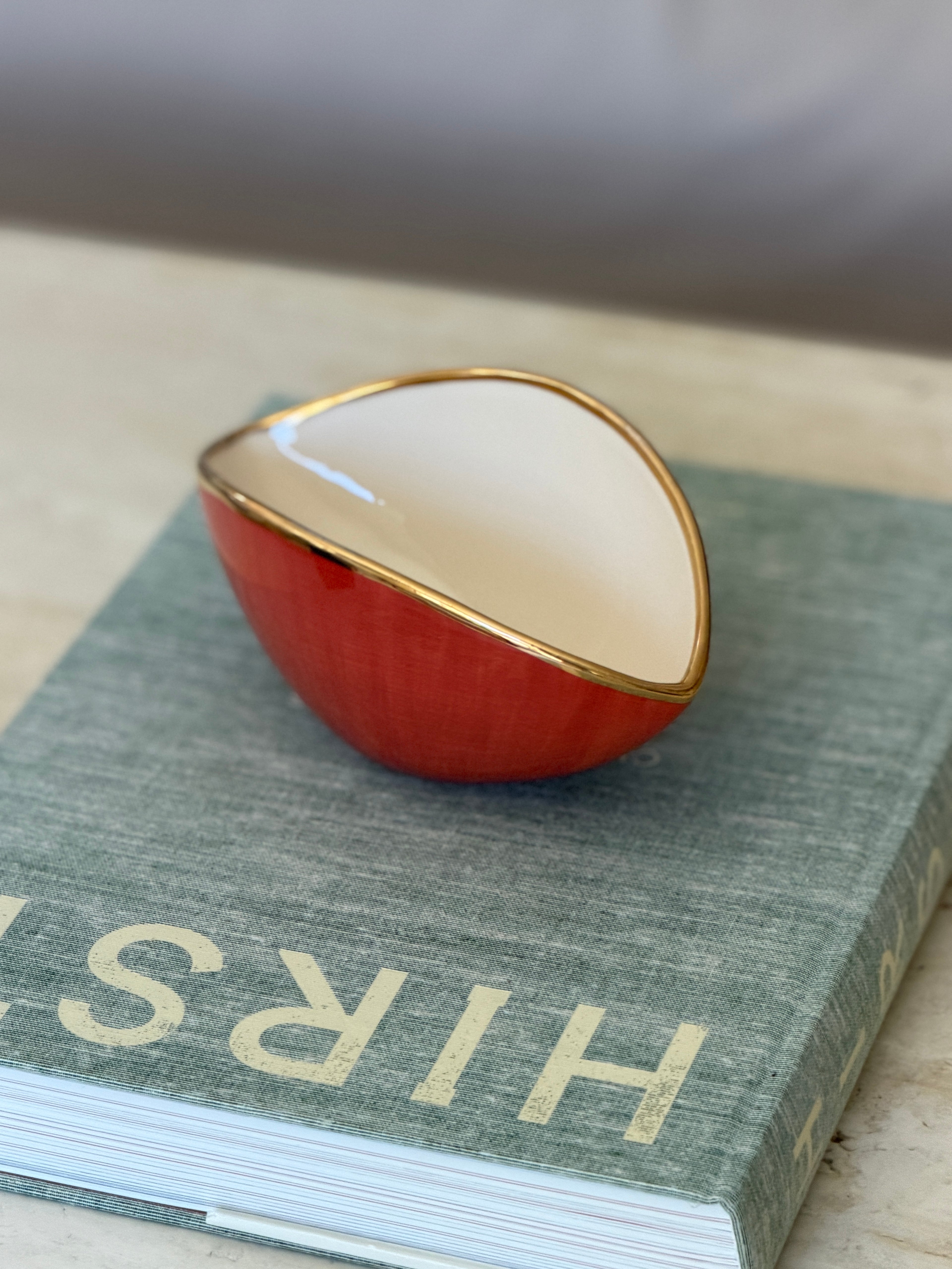 L Objet Oval Bowl in White Porcelain with Orange Glaze 24kt Gold Trim | Collectors Gene