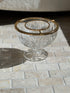 Side view of the footed crystal caviar server, showing the pointed leaf cuts on the bowl and the faceted pedestal foot