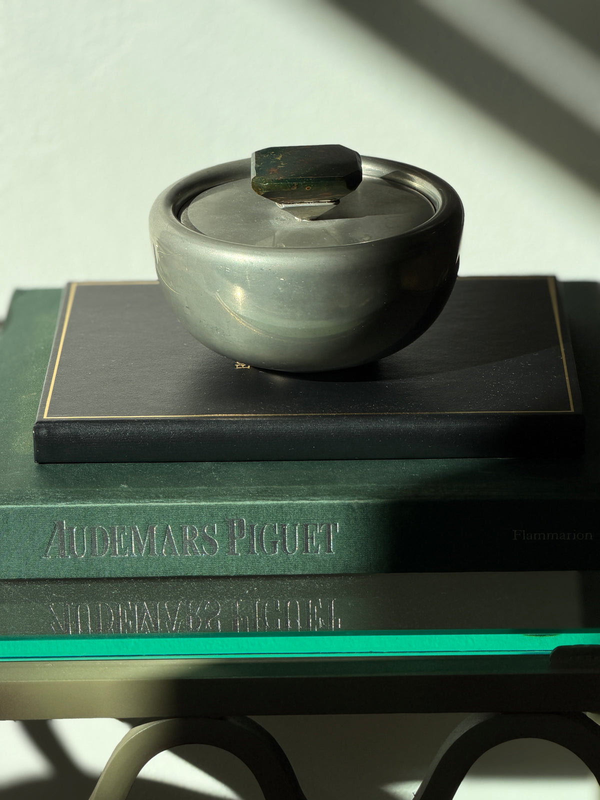 Eye-level view of 1952 Svenskt Tenn Swedish pewter lidded bowl designed by Estrid Ericson