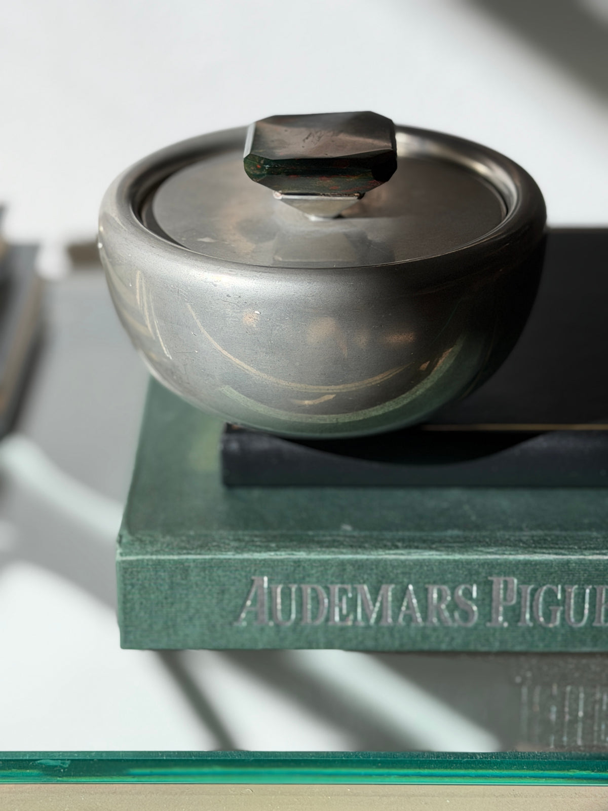 Side profile view of Scandinavian Modern pewter trinket dish with bloodstone accent available at Collectors Gene