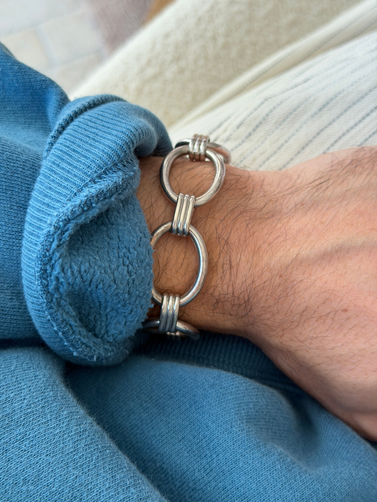 Bracelet worn on the wrist, another close angle showing the link detail