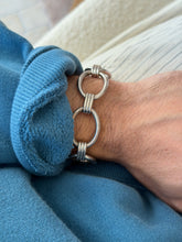 Bracelet worn on the wrist, another close angle showing the link detail